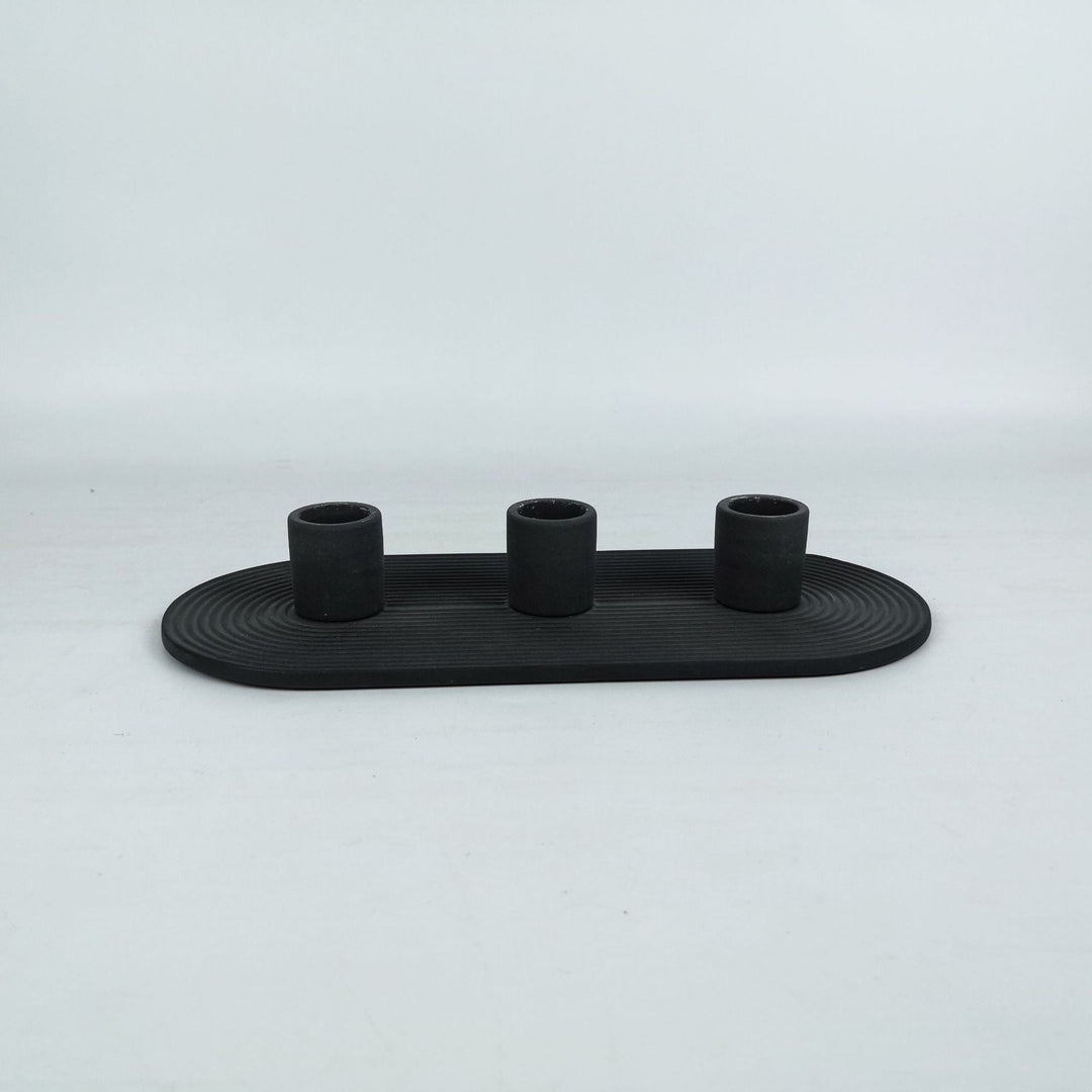 Lysestake i keramikk