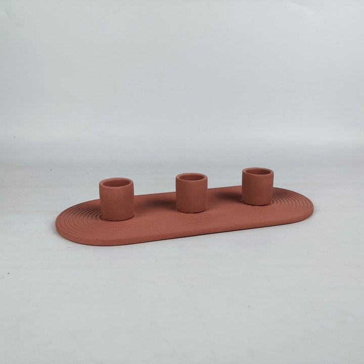 Lysestake i keramikk