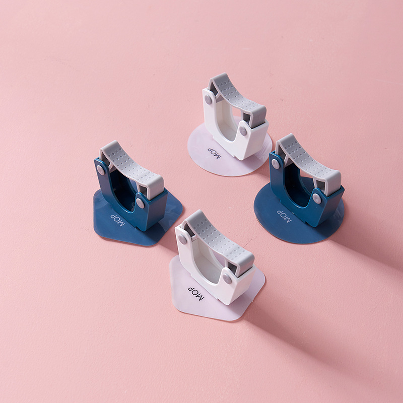 Veggfestet oppheng for mopp