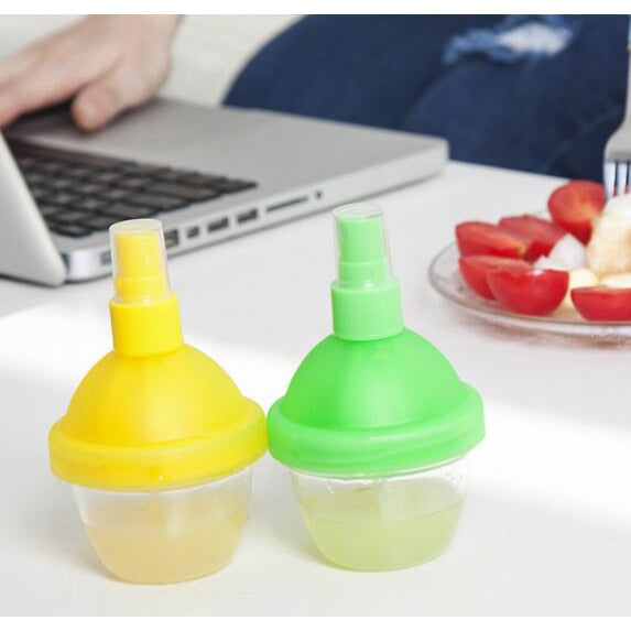 Sprayflaske for sitronsaft