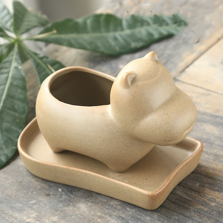 Dyreformede blomsterpotter i keramikk