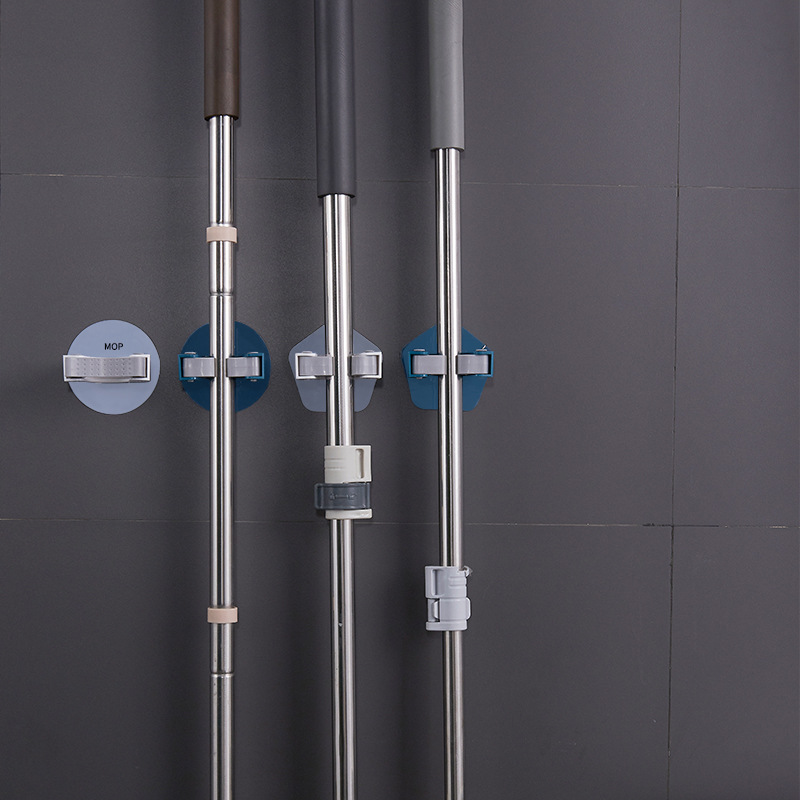 Veggfestet oppheng for mopp