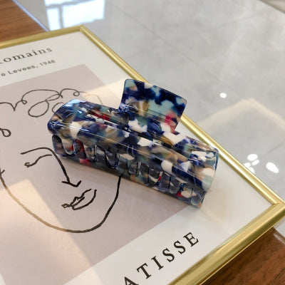 Moderne hårklyper i marmordesign